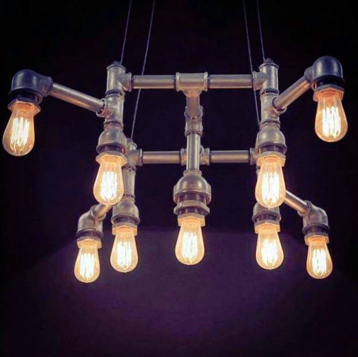 Металните тръби и лампите Edison са подходящи за стил таванско помещение